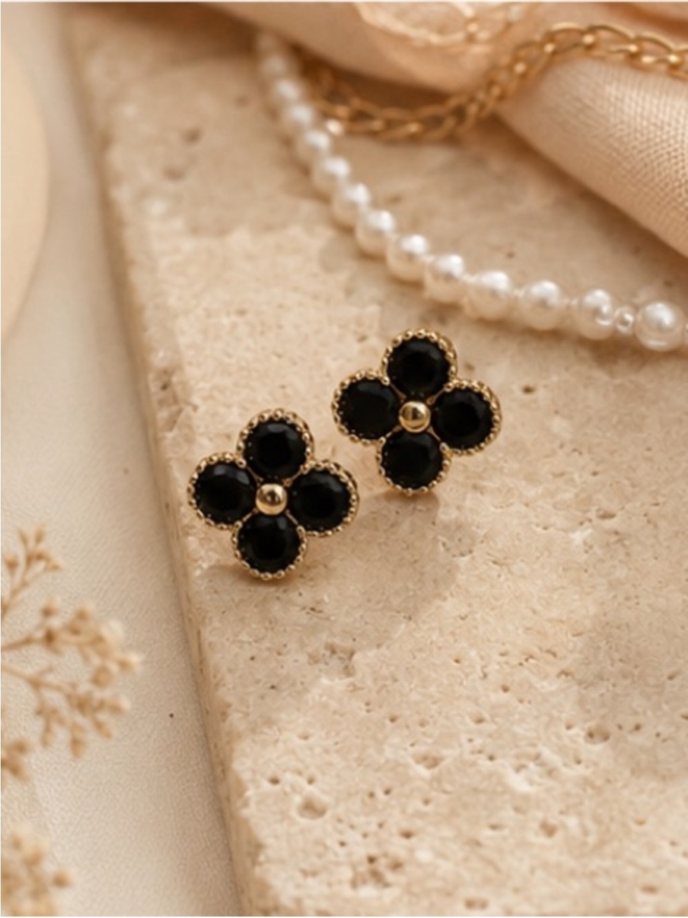 Black Faceted Clover Stud Earrings with Gold Tone Trim